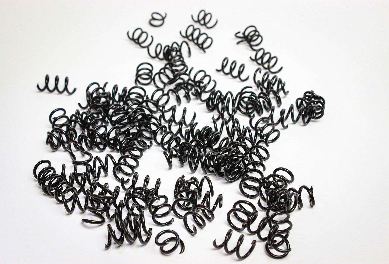 Replacement pod cartridges and coil heads laid out in bulk packaging